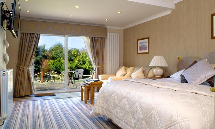 Ground floor superior bedroom at Ty'n Rhos country house